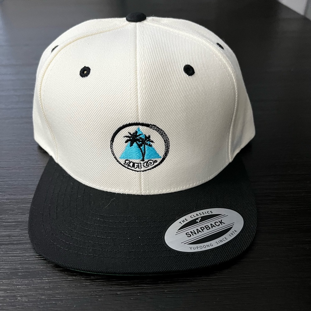 NWOT The Classics Snapback “Safi Co” logo hat, blk and Wht, adjustable size.